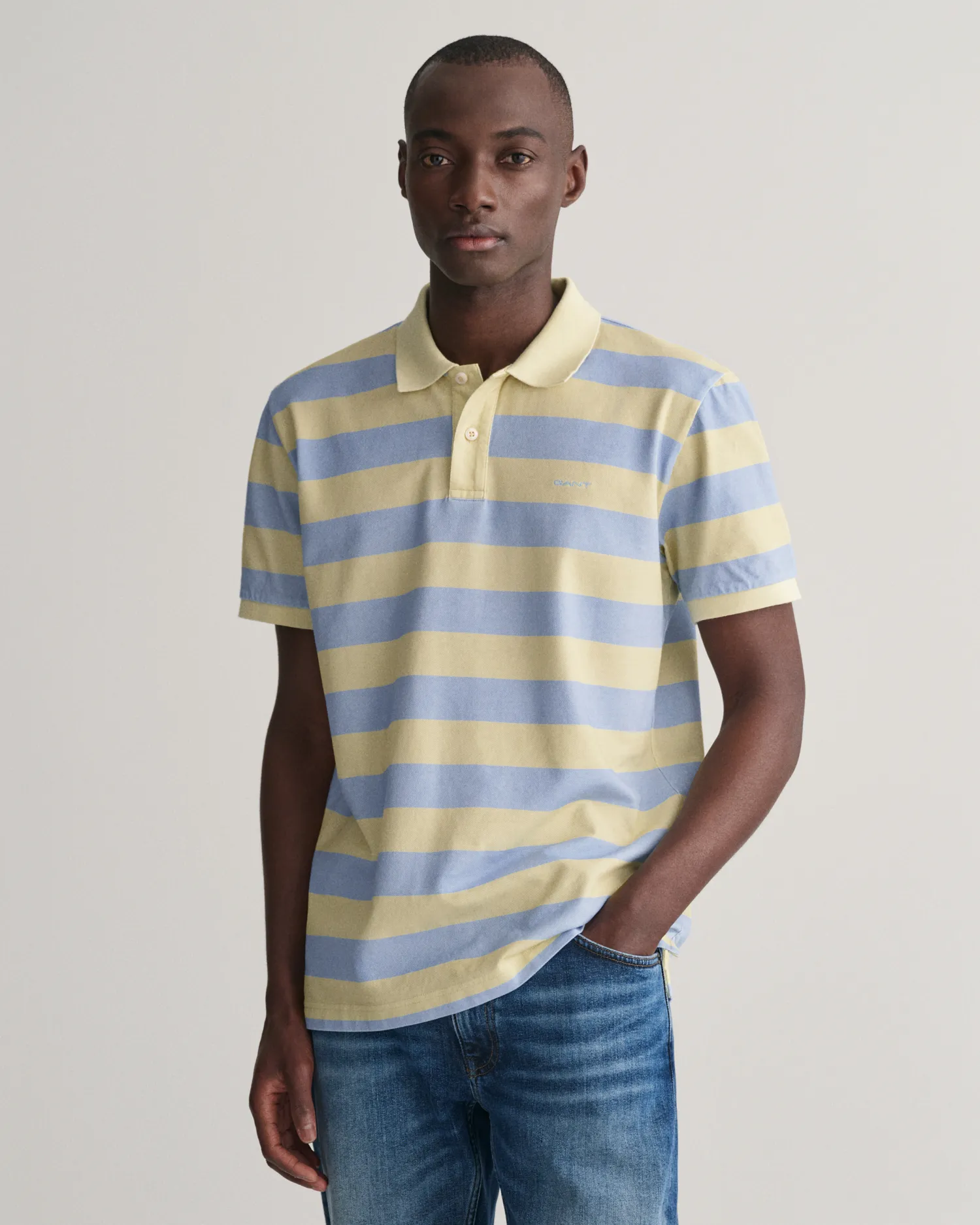 Polo a righe con délavé pesante